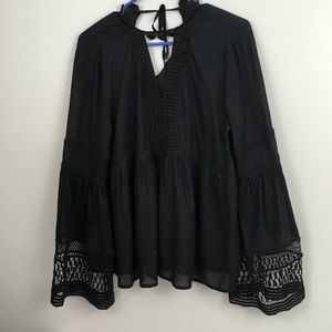 A. N. A. Size S black top.